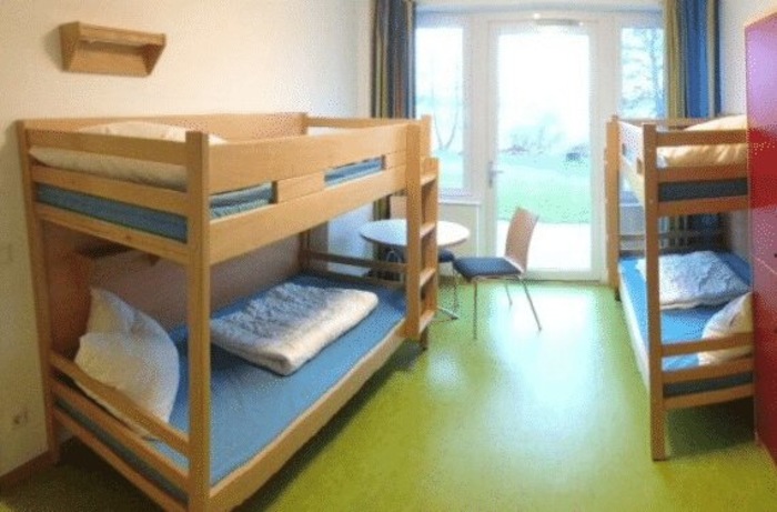 Zimmer mit zwei Doppelstockbetten im Englischcamp in Schleswig-Holstein